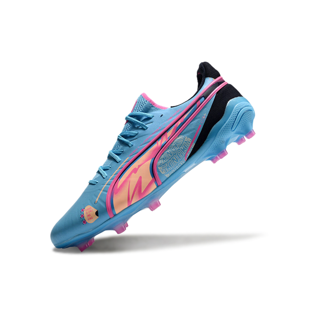 Chuteira Campo Puma King Ultimate FG Azul e Rosa 